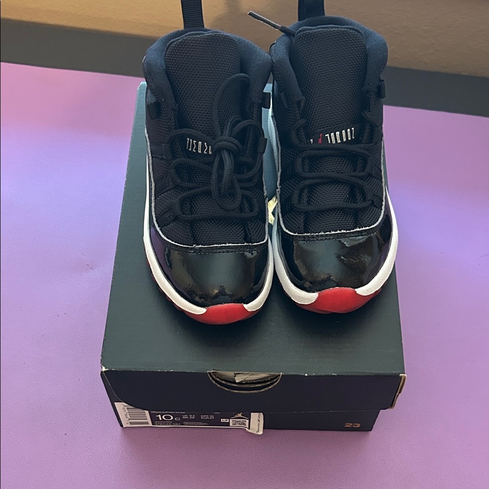 Jordan 11 Retro “Bred” Sneakers  (TD)